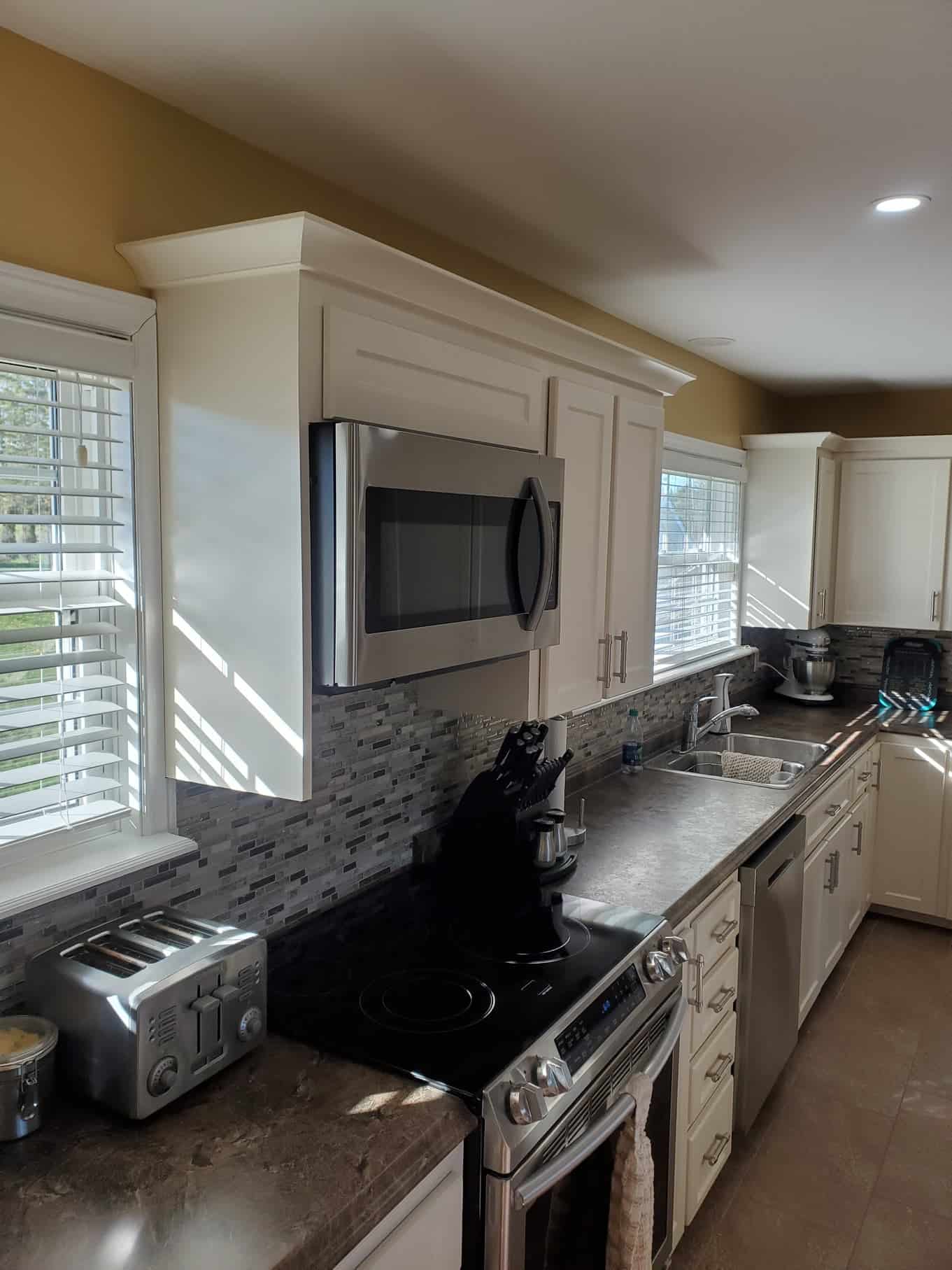 Furniture restoration workshop with cabinetry and refinishing work